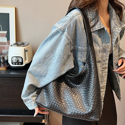 Sacs et sacoche noire en cuir pour femme, élégante et fonctionnelle