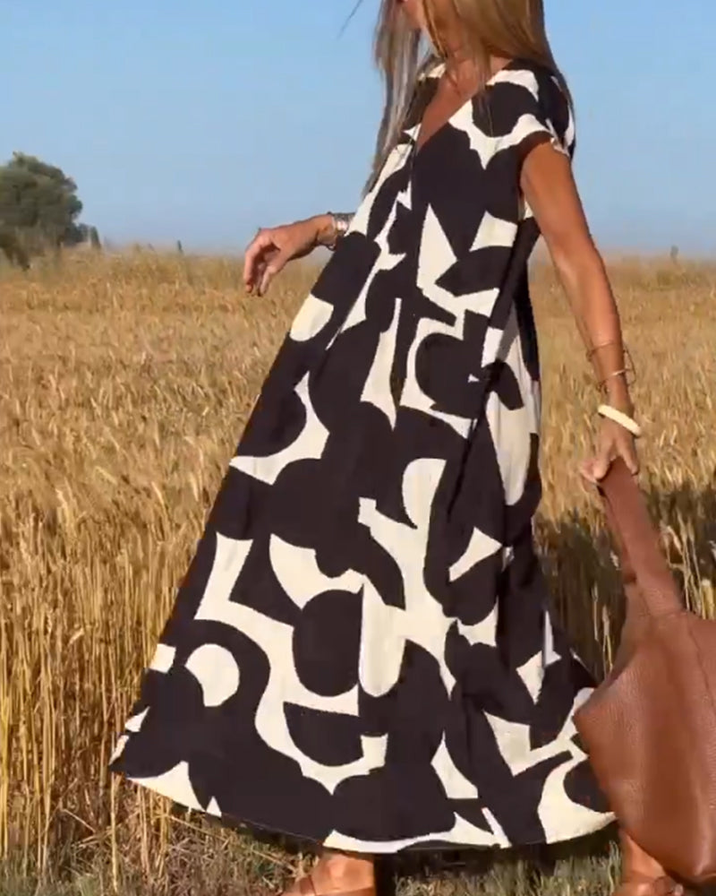 SITA - ROBE IMPRIMÉE AVEC COL EN V