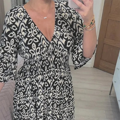 Ciona | Robe fleurie avec décolleté en V
