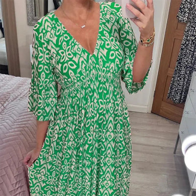Ciona | Robe fleurie avec décolleté en V