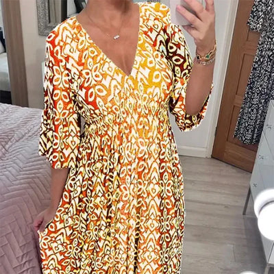 Ciona | Robe fleurie avec décolleté en V