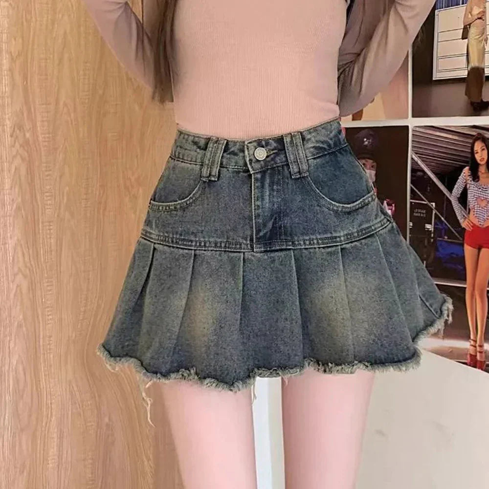 Taylor – Jupe en jean plissée avec effet usé