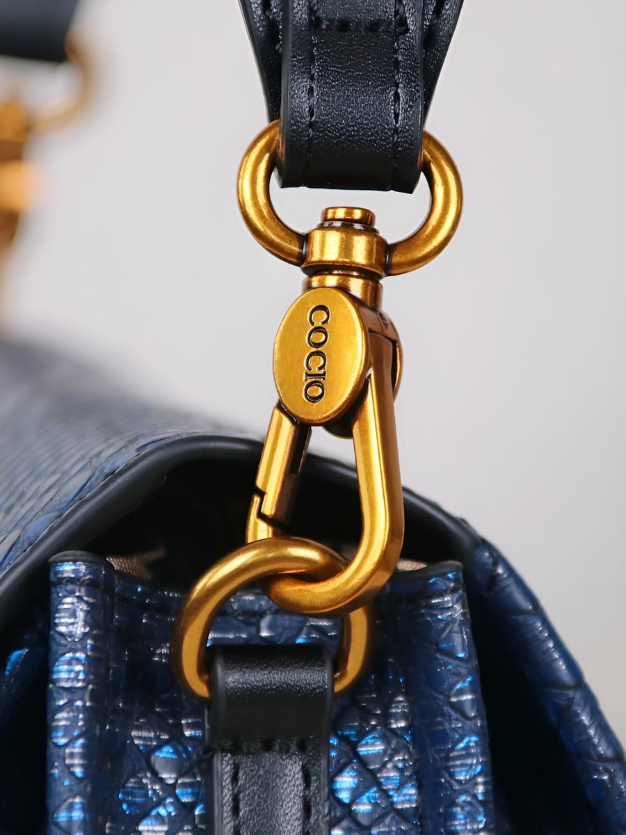 Sac à bandoulière à imprimé serpent en relief