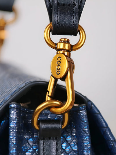 Sac à bandoulière à imprimé serpent en relief