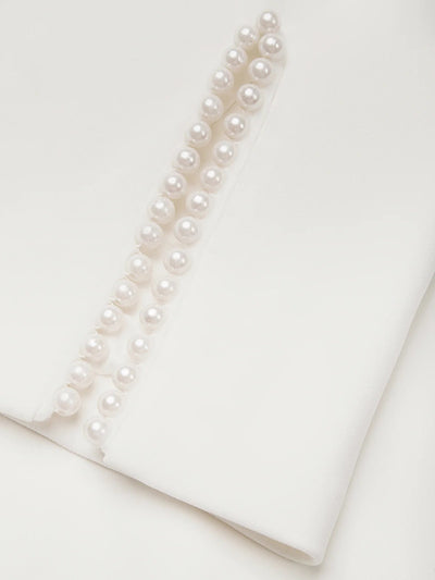 Robe mi-longue classique avec perles